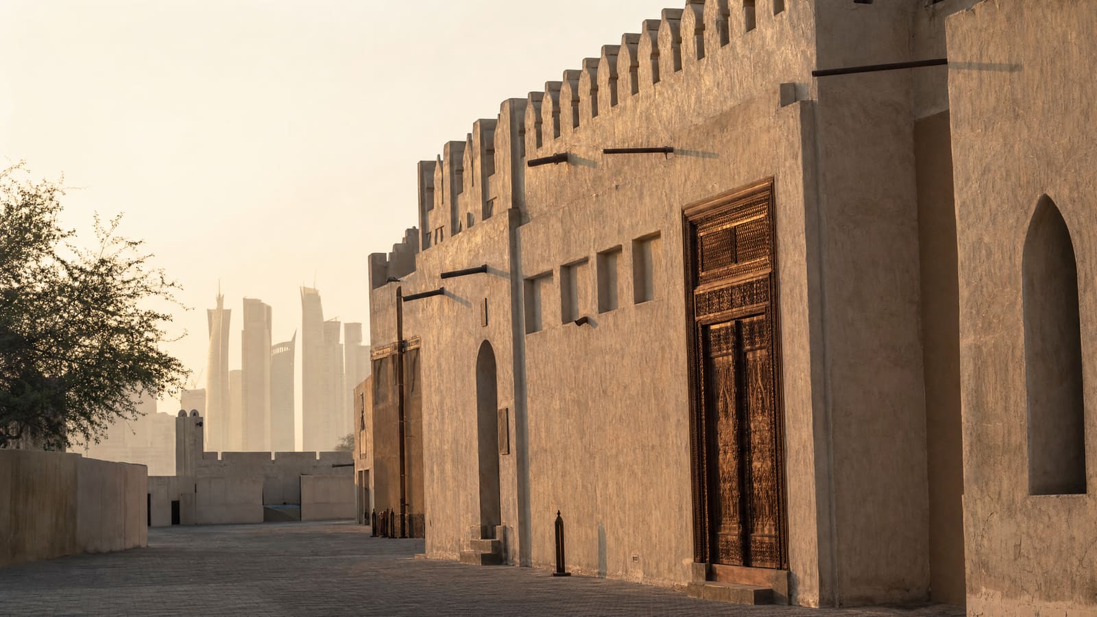 Traditional and modern architecture meeting in Doha with soft morning light